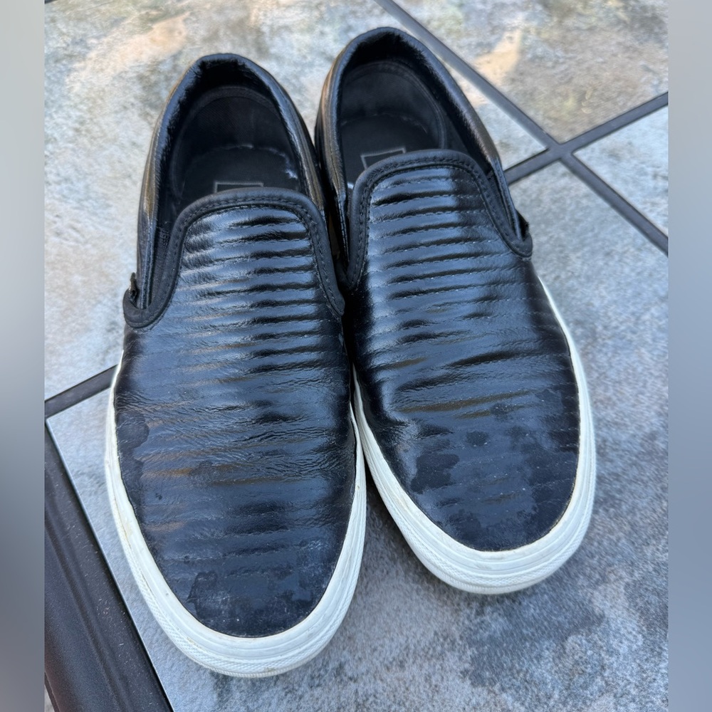 Vans black pleather slip ons
